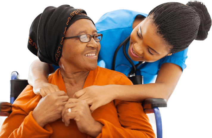 A nurse and an elderly woman are smiling.