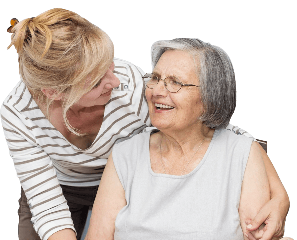 A woman and an older person smiling for the camera.