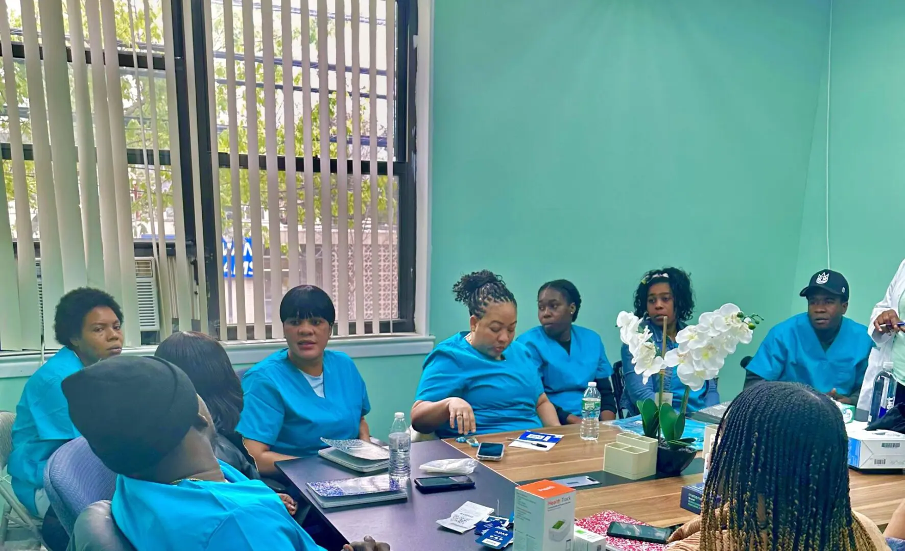 A group of women sitting at a table.